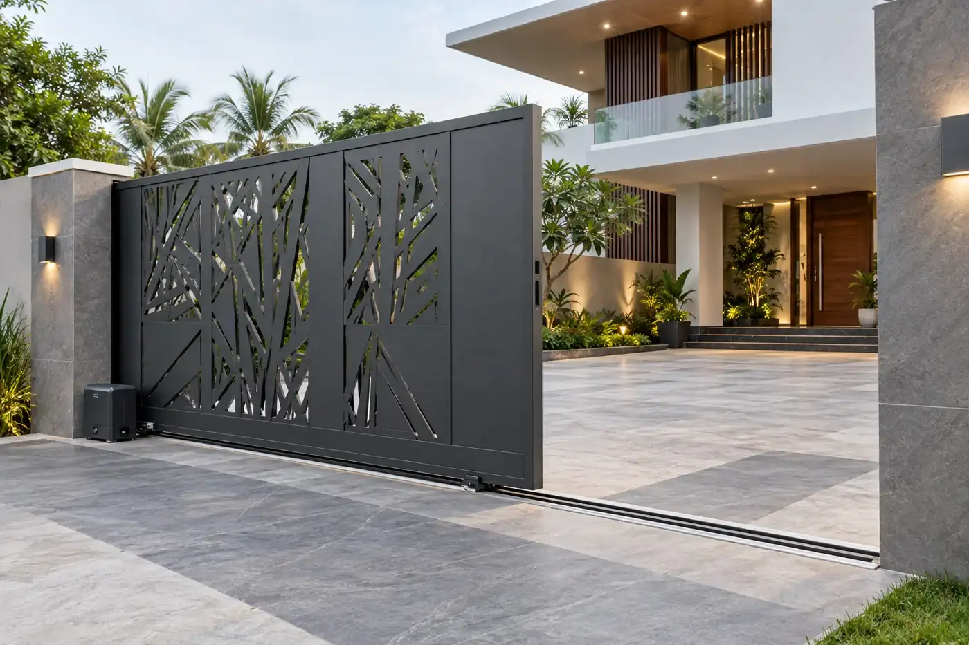 Charcoal sliding driveway gate with a laser-cut branching pattern and ground track — AI-created design concept